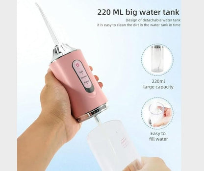 Irrigador oral portátil.